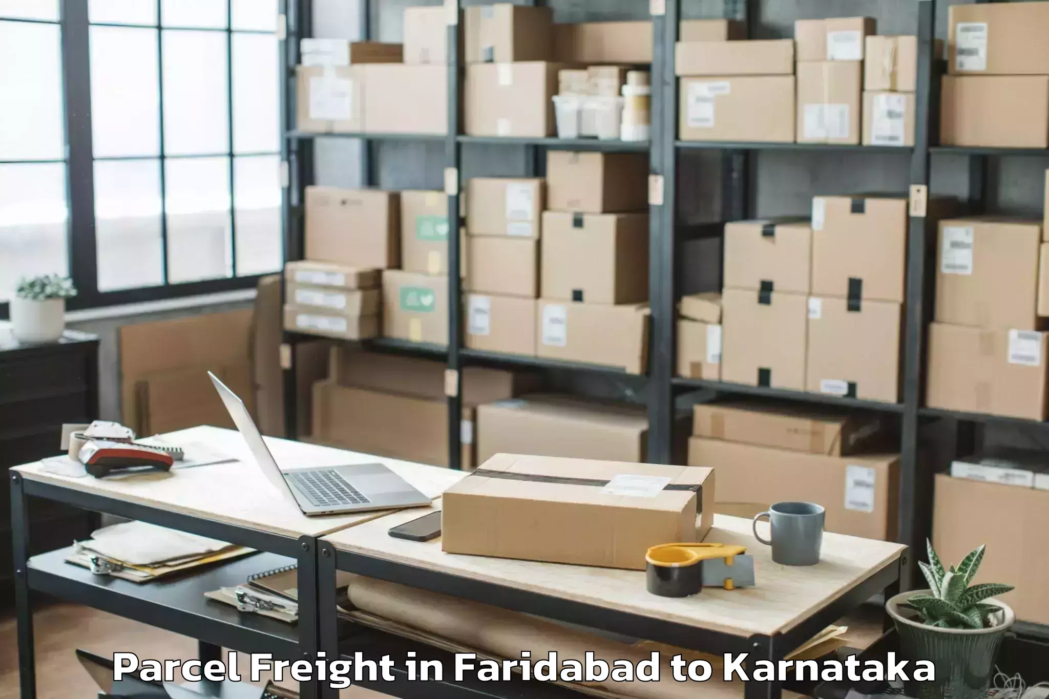 Top Faridabad to Savanur Parcel Freight Available